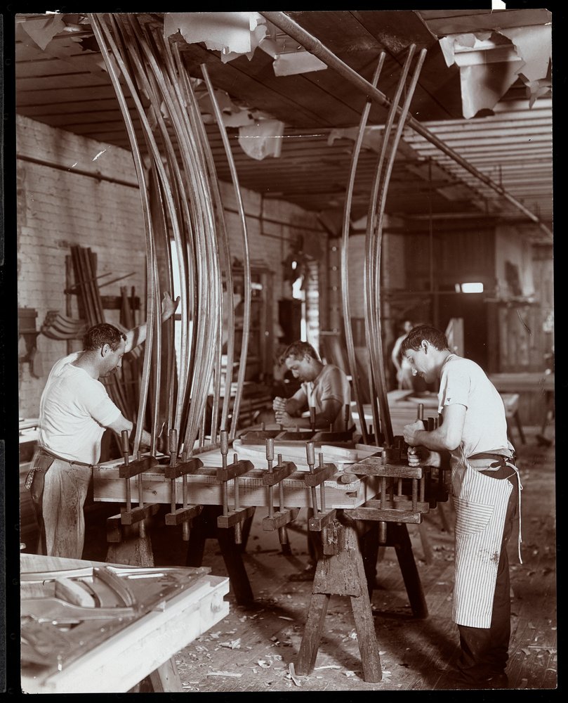 Men Working in a Piano Factory by Byron Company