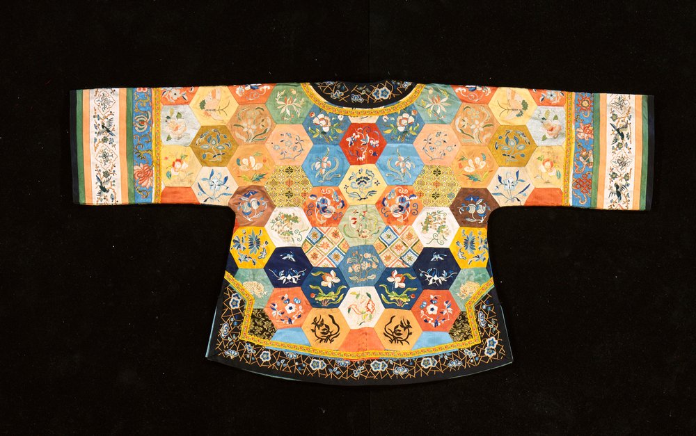 A Chinese informal patchwork coat, composed of hexagons of embroidered ...