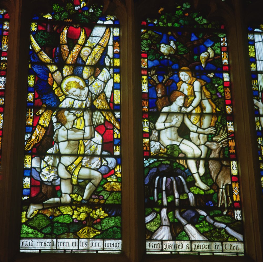 Stained glass windows depicting The Annunciation and Adam and Eve in ...