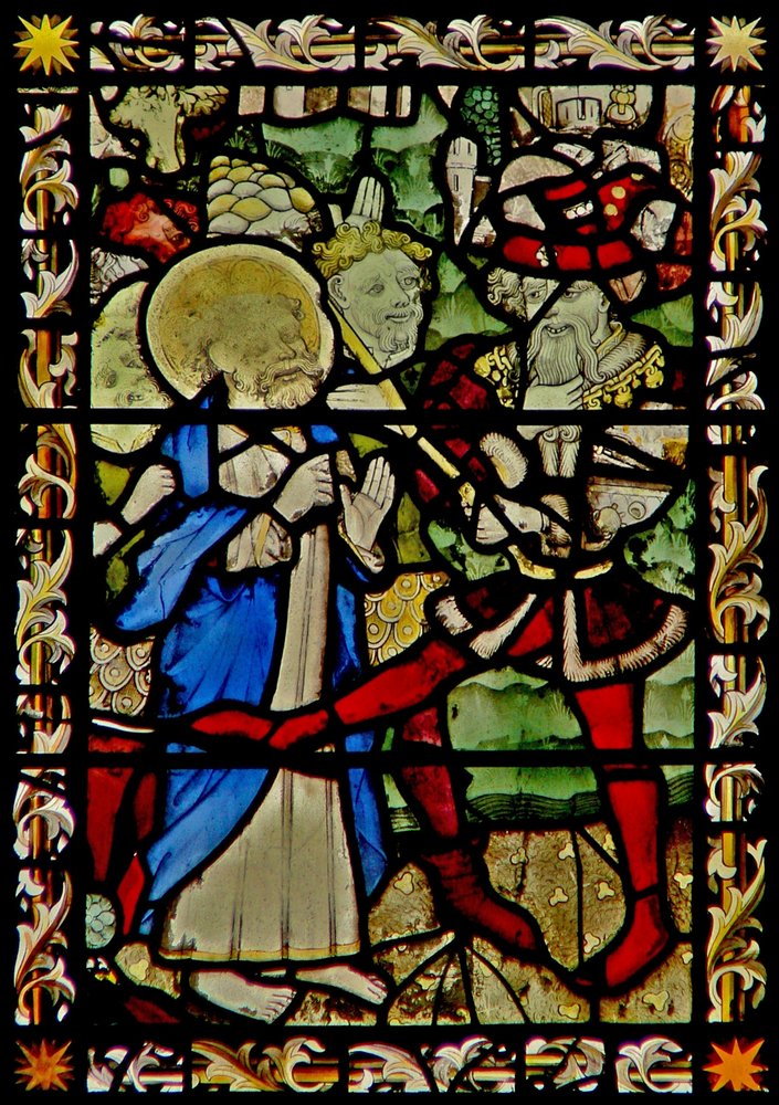 The east window depicting St Peter with the Emperor Nero