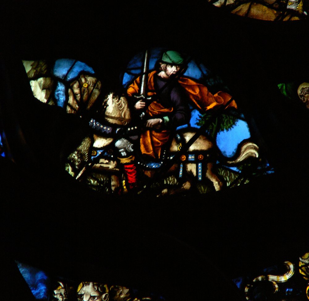 The west rose window depicting a scene from the Book of Revelation A