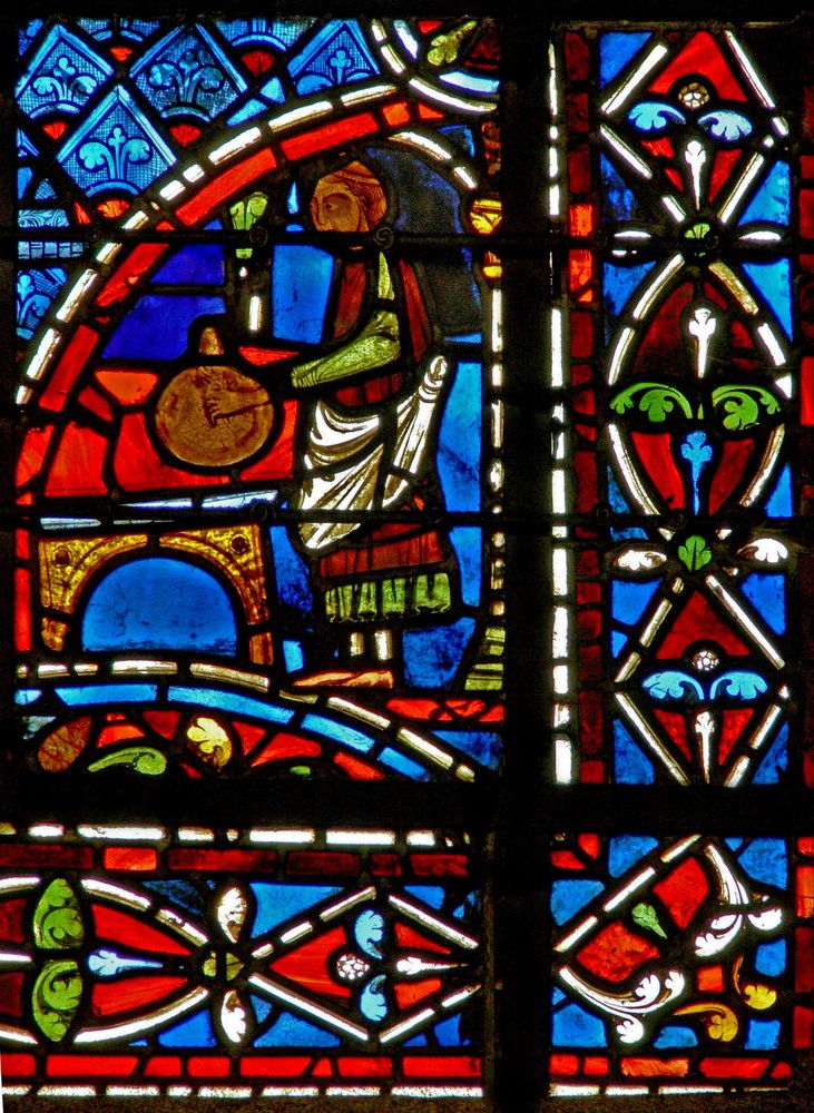 Window w11 depicting a draper donor and border panels