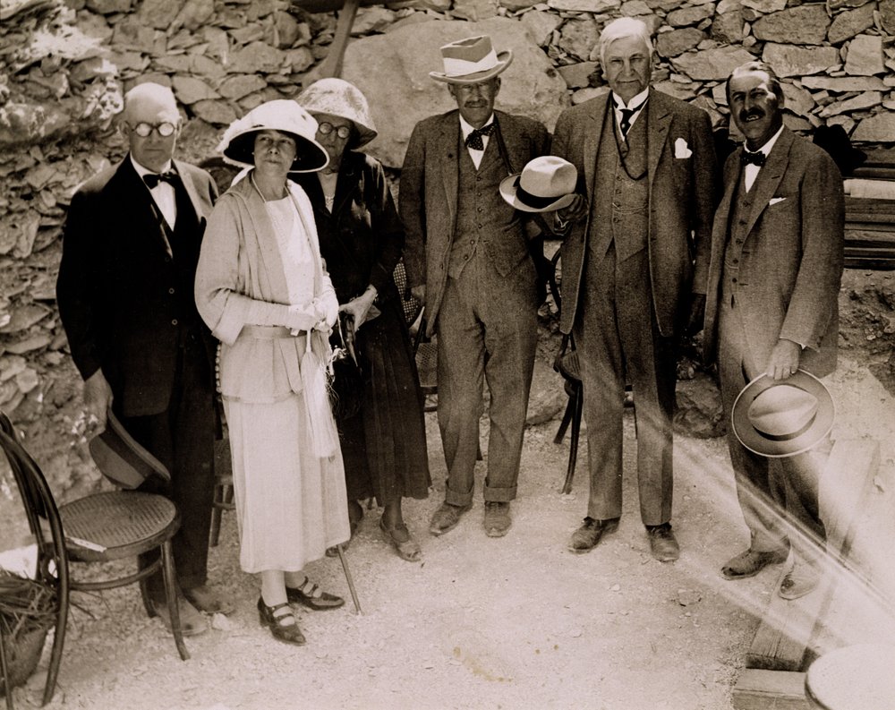 Howard Carter and a group of Europeans standing beside the excavations ...