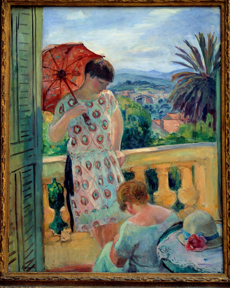 Two women on a balcony or on the balcony, in view of the Esterel ...