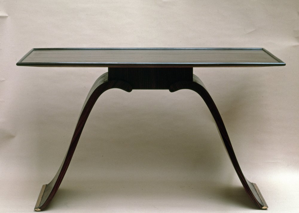 Macassar ebony table, with brass-bound feet, by Émile-Jacques Ruhlmann, c.1930-32 by Jacques-Emile Ruhlmann