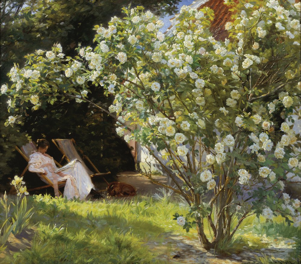 Marie Krøyer seated in the deckchair in the garden by Mrs Bendsen