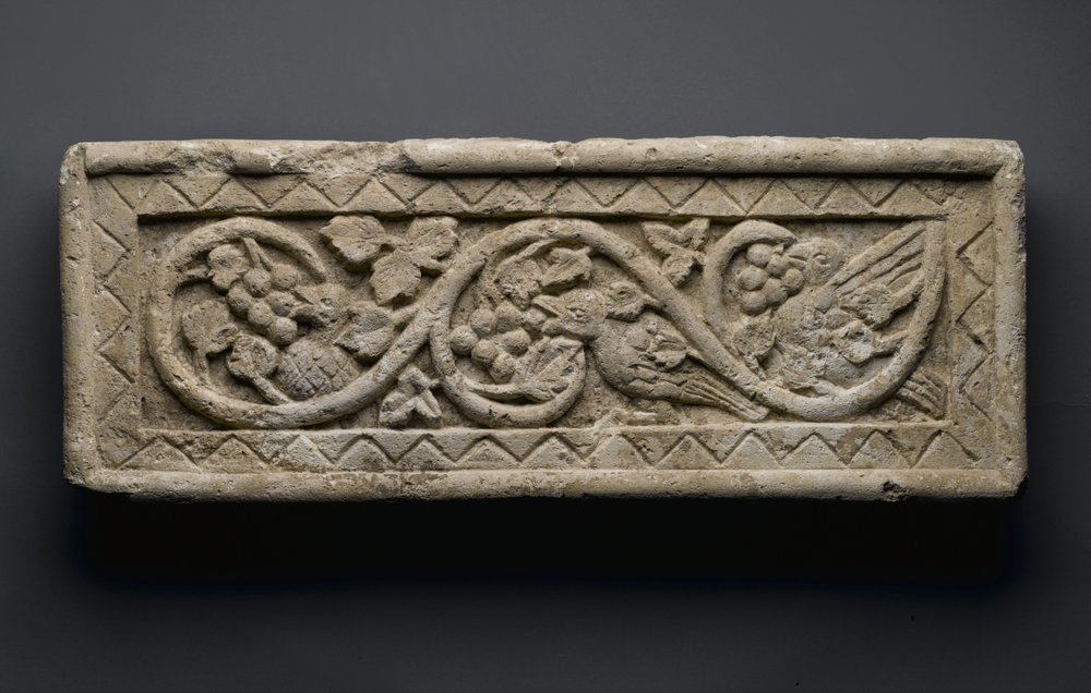 Relief of a plant scroll enclosing birds and grapes, from Behnesa, 5th ...