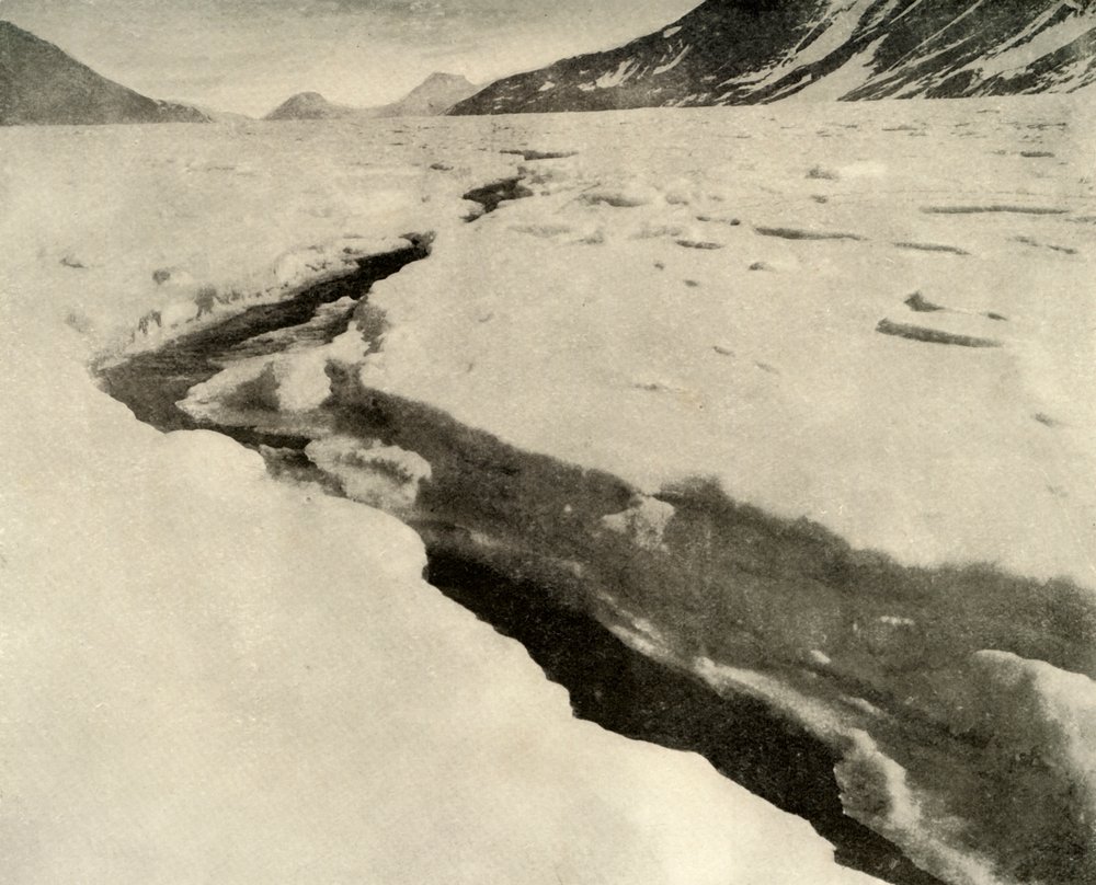 Stream of Running Water in the Middle of the Ferrar Glacier in Midsummer