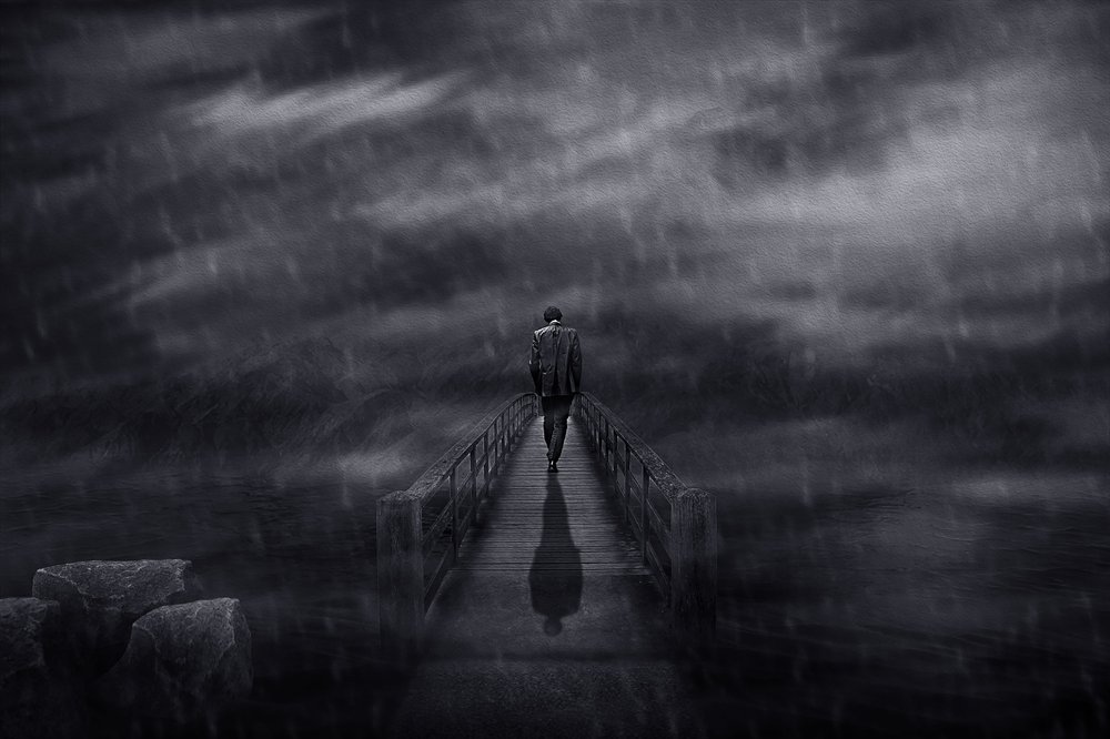 Man On A Stormy Bridge by Che Abu Bakar