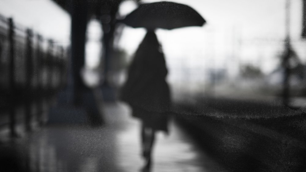 Solitary Figure in Rain by Che Abu Bakar