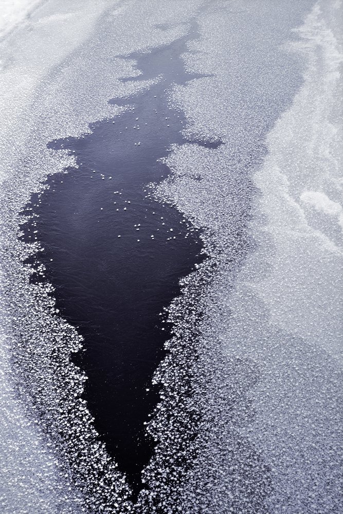 Dark Water Through Ice by Christina Sillen