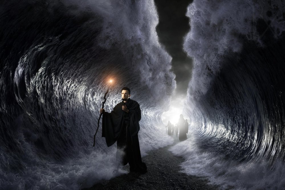 Man Parting Dark Waves by Christophe Kiciak