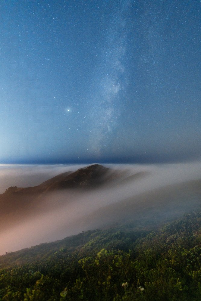 Milky Way Foggy Mountains by Chuanxu Ren