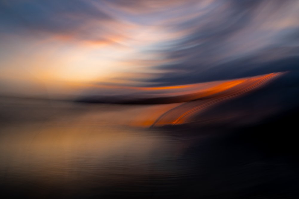 Vibrant Sunset Motion Blur by Franco Tessarolo