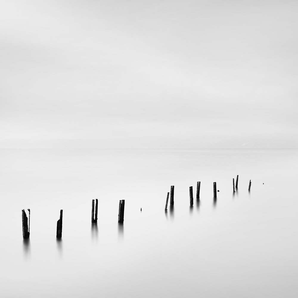 Minimalist Pilings Water by George Digalakis