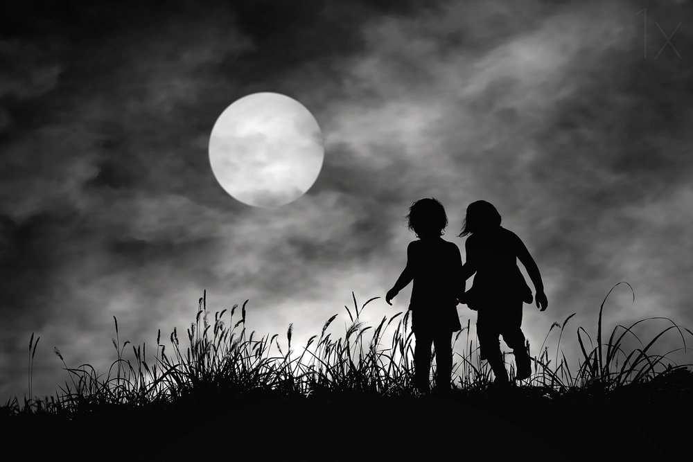 Moonlit Silhouettes Walking by Hengki Lee