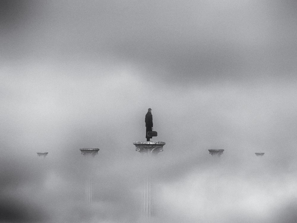 Lone Traveler in Mist by Jeffrey Hummel