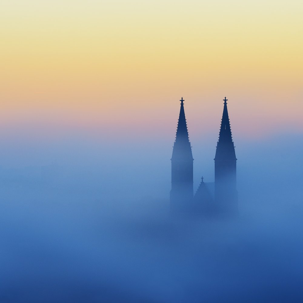 Foggy Church Spires by Marek Kijevský