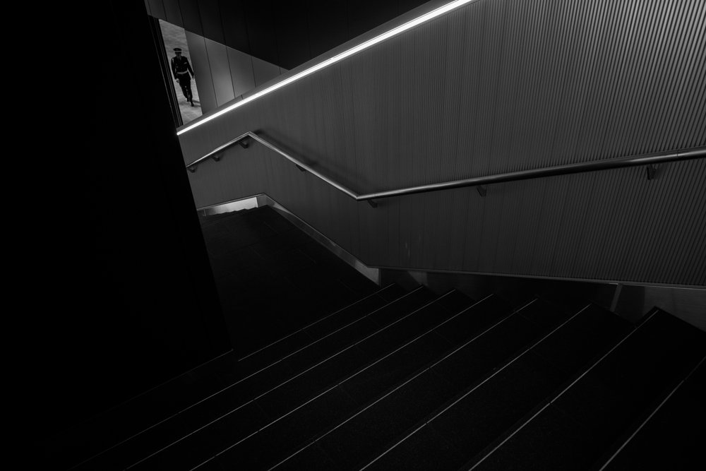 Man on Modern Stairs by Satoshi Hata