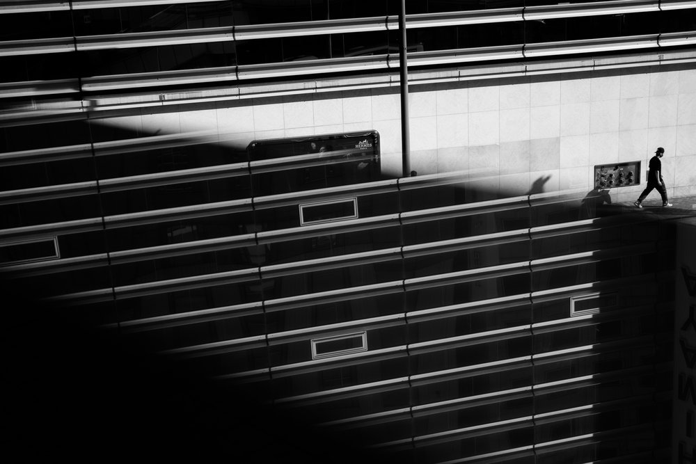 Urban Shadow Walker by Satoshi Hata