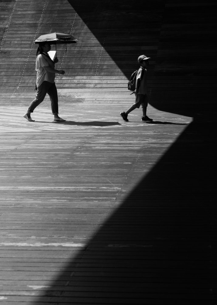 Walking in Light and Shadow by Satoshi Hata