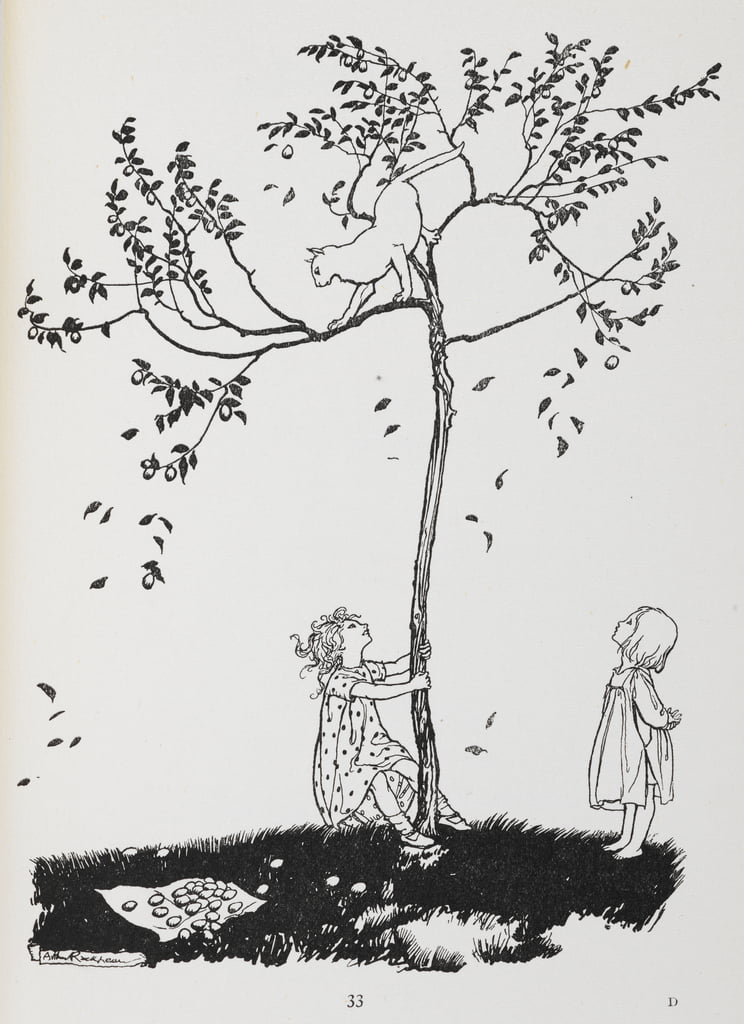 Two children try to get a cat down from a tree.
