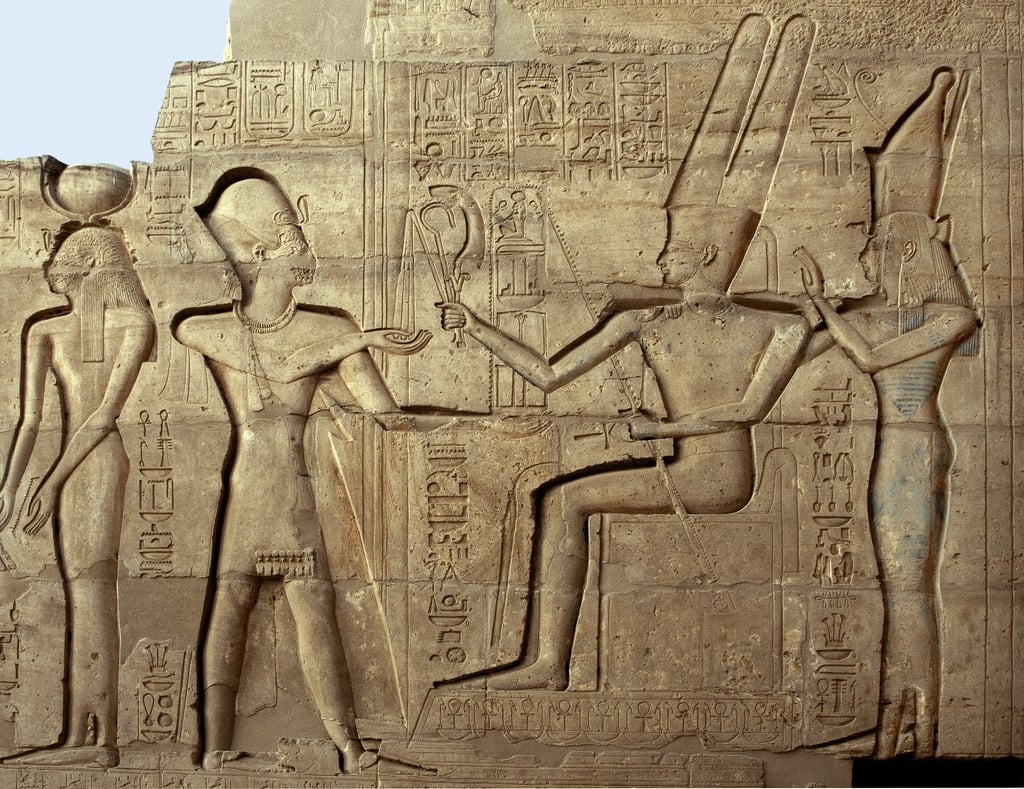 Egyptian antiquite: relief depicting Pharaoh Ramses II in front of two of the deities of the Theban triad, Amon and Mut; Funeral Temple dedicated to Pharaoh Ramses II (1279-1213 BC), site of