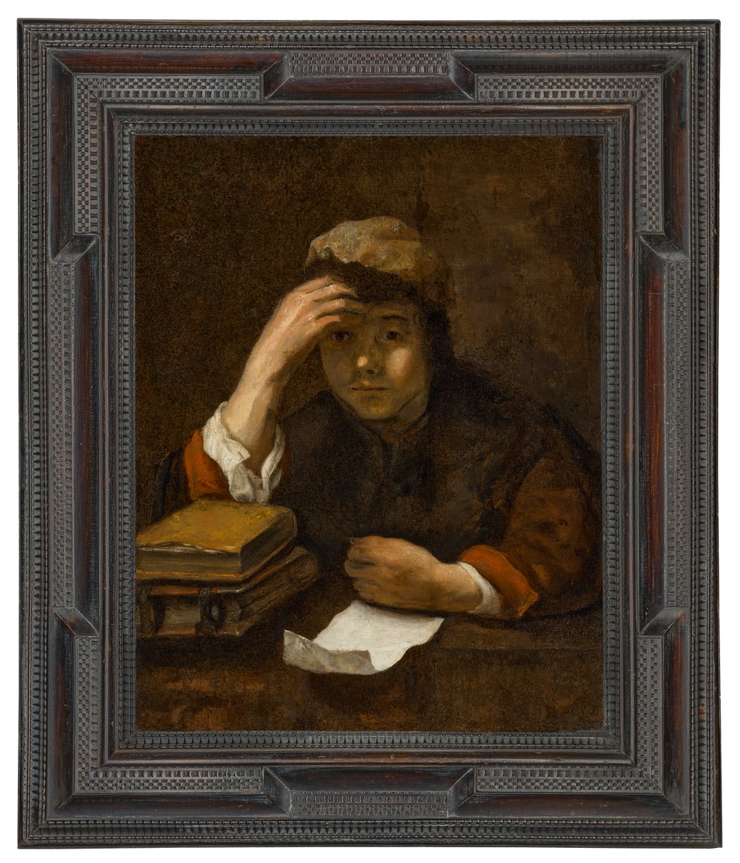 A Boy Reading by (studio of) Rembrandt Harmensz. van Rijn