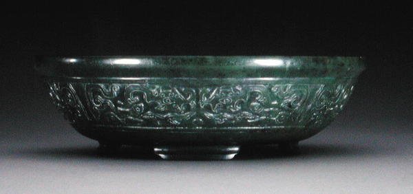 Marriage bowl with a band of archaistic phoenix and fish on four bracket feet by Chinese School