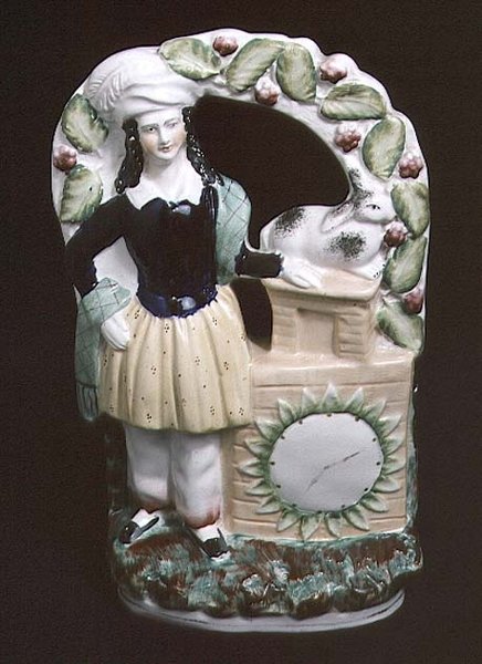 Staffordshire figure of a man with a rabbit, 1840 by English School