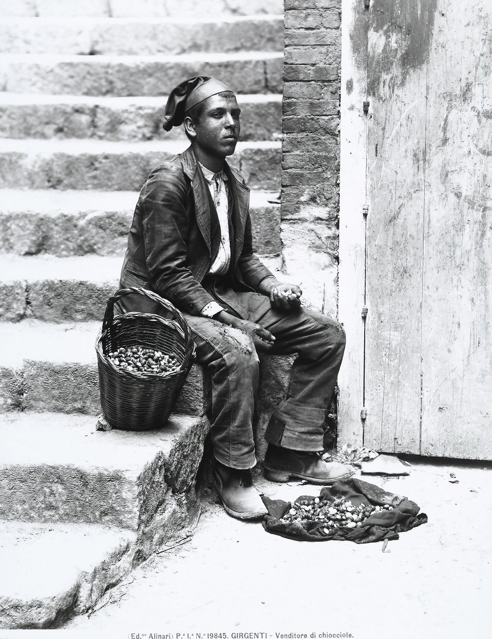 Sea-snail vendor in traditional dress, in Girgenti by Italian Photographer