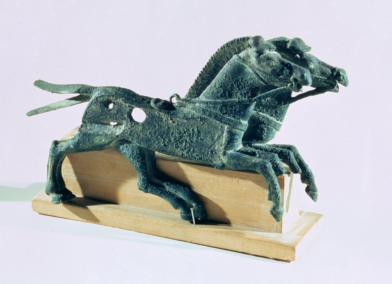 Cheek pieces in the form of horses, found in ashes in the portico of the Hundred Column Hall at Persepolis by Achaemenid