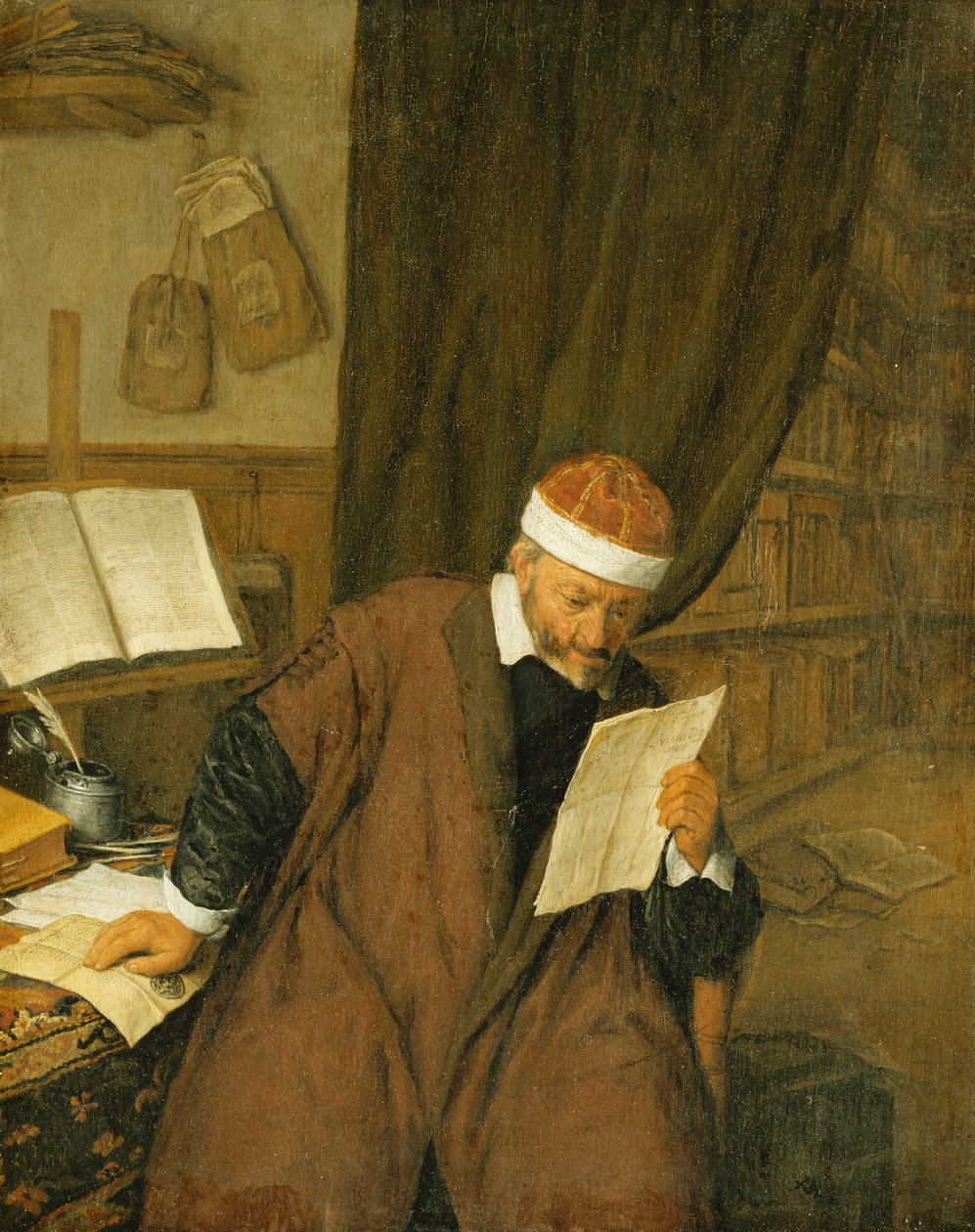 A Lawyer Seated at a Desk Reading a Letter, a Library Beyond, 1668 by Adriaen Jansz. van Ostade