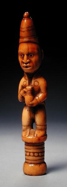 Figure in European Dress Holding a German Stoneware Jug, Congo, Early 19th Century by African