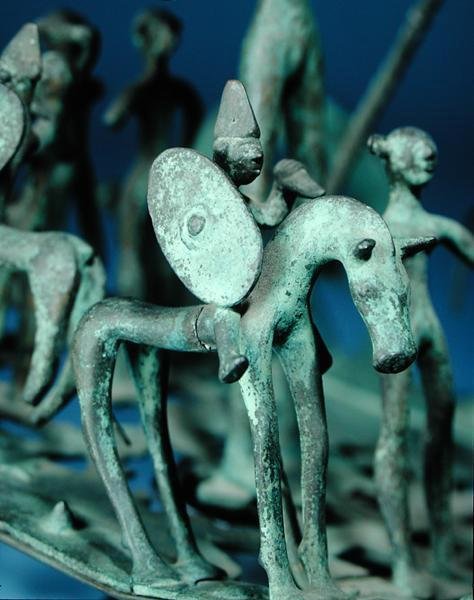 Replica of a horse and rider on a ceremonial bronze sculpture from Strettweg, Austria by Age Iron