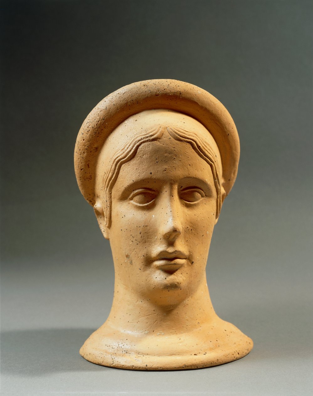 Close-up of a bronze votive feminine head with a cap, Italic civilization, 4th-3rd century BC by Nicolas Toussaint Charlet