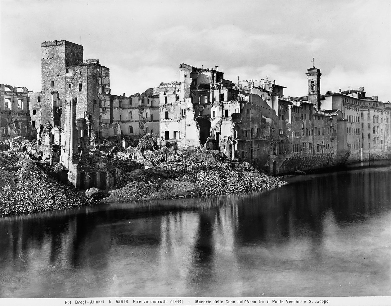 World War II: the houses along the Arno River, between the Ponte Vecchio and San Jacopo in Florence, after the bombing. This photograph was formerly part of the Brogi Collection, but now belongs to the Alinari Collection by Fratelli Alinari