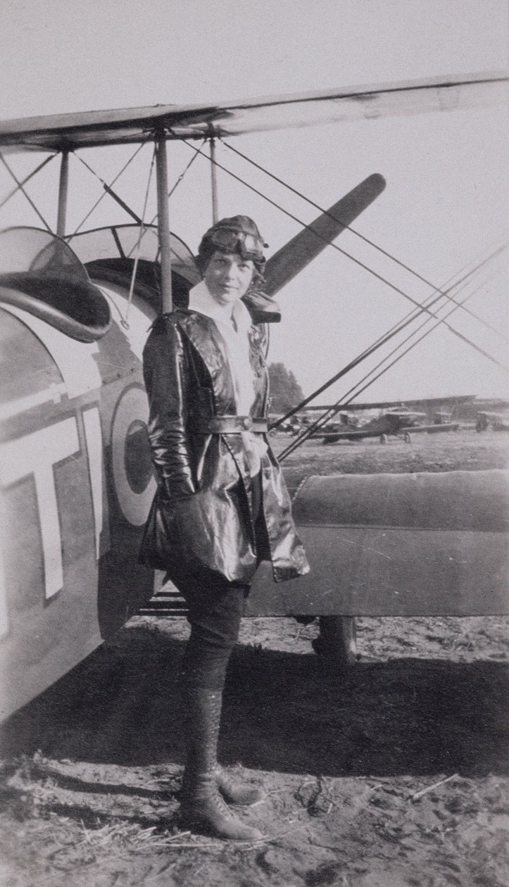 Amelia Earhart (1897-1937) Next to the McLintic Bi-plane, c.1922 by American Photographer