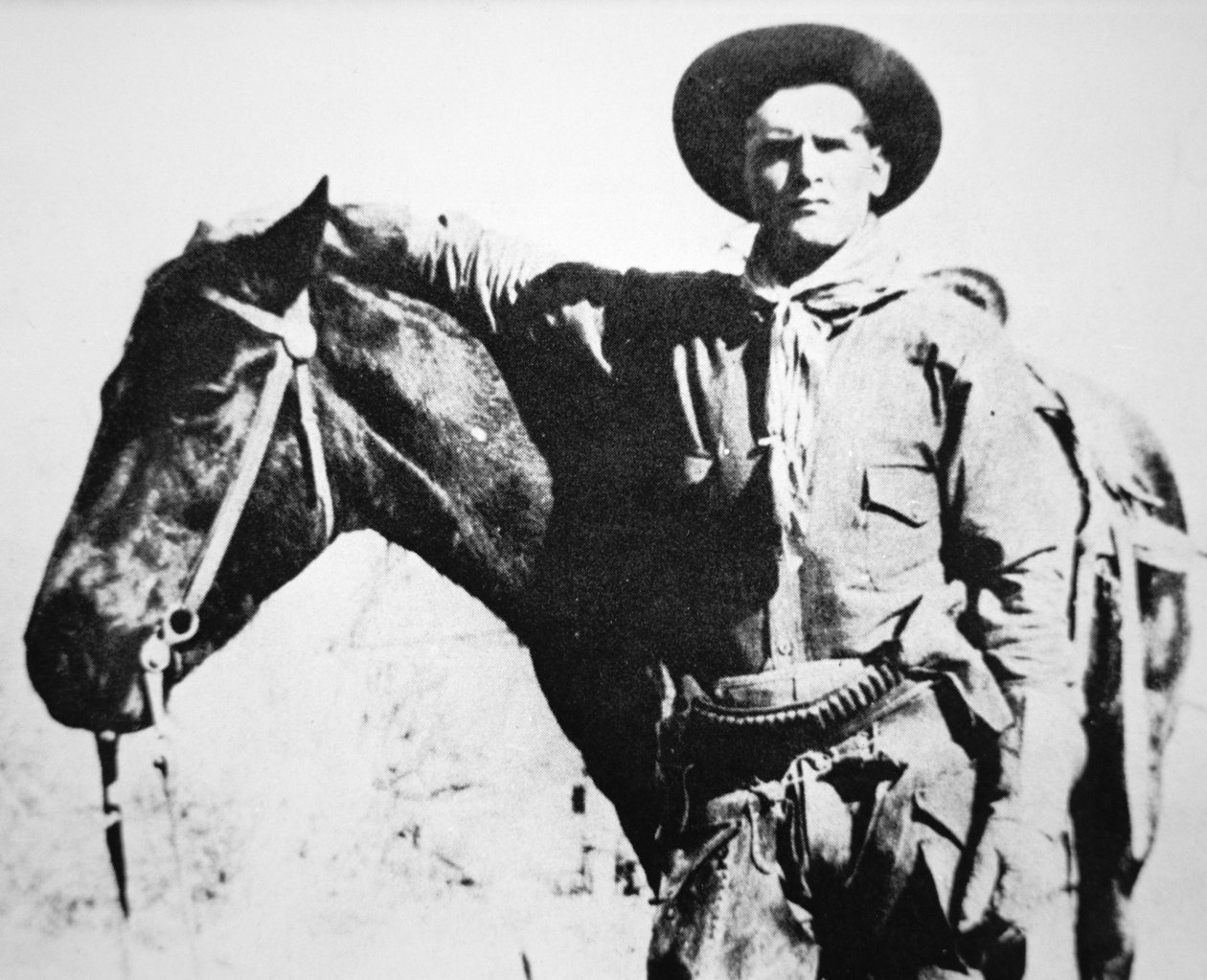 Butch Cassidy (1866-1908/09) with his horse by American Photographer