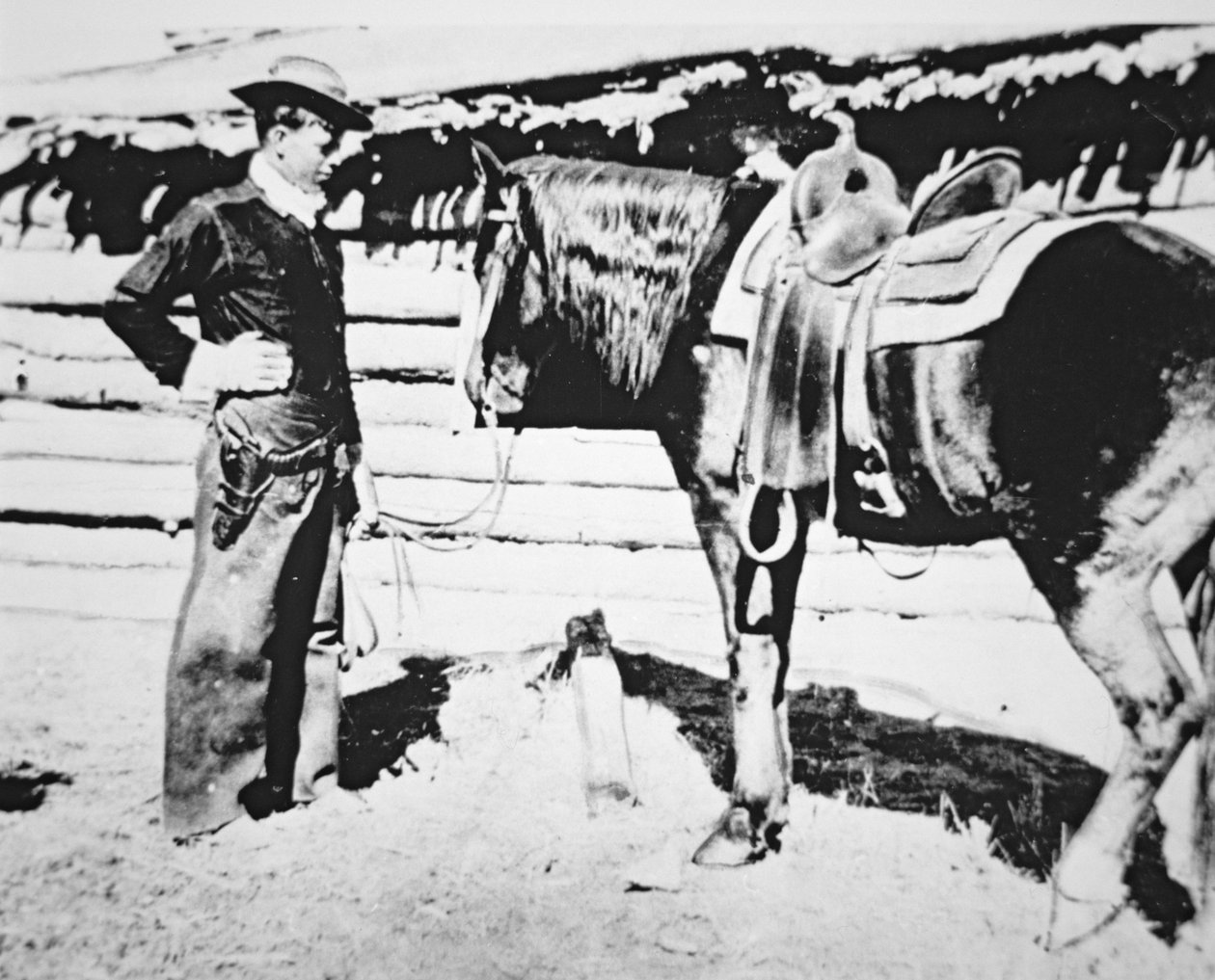 Butch Cassidy (1866-1908/09) with his horse by American Photographer
