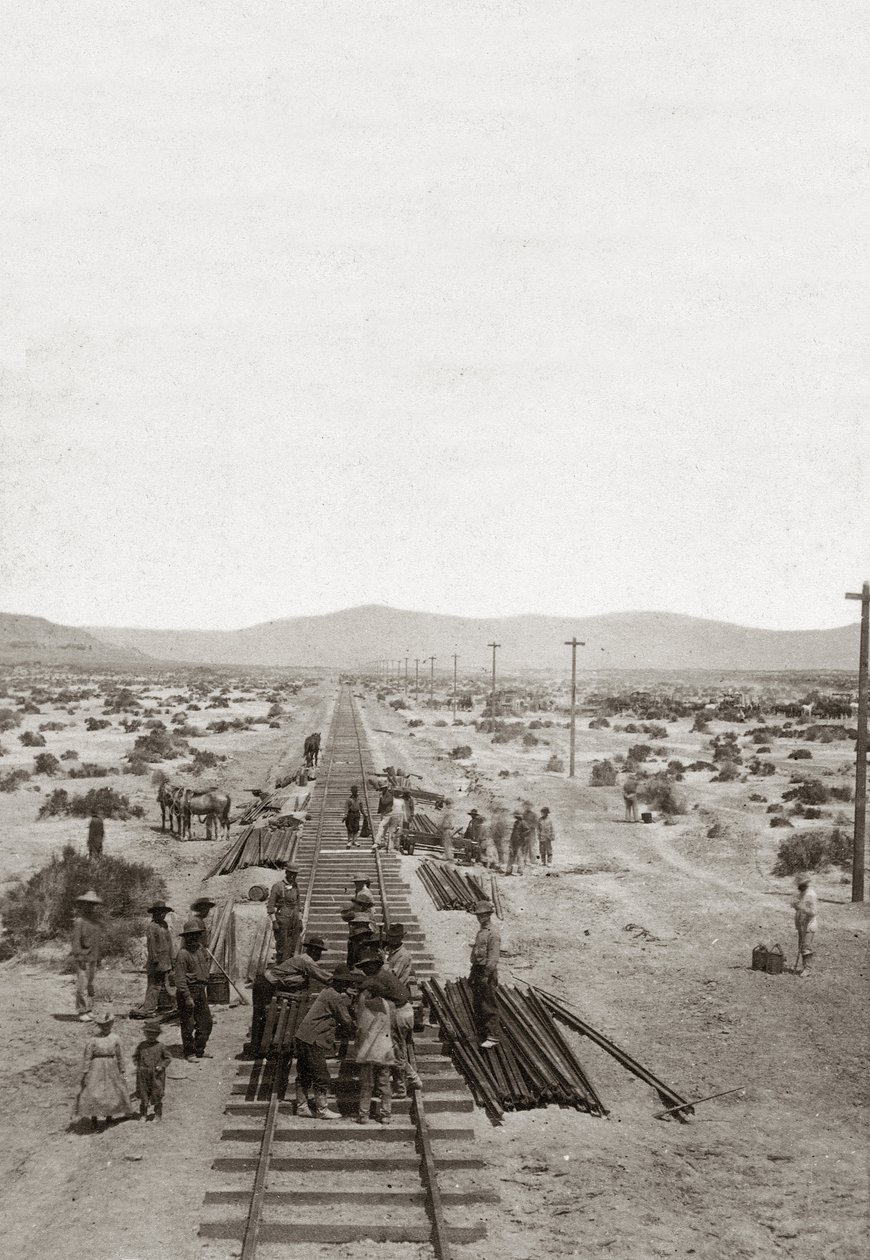 Construction in 1869 of the Central Pacific Railways - Nevada - Workers building the railway lines of the Central Pacific Company to build the first North American transcontinental railway by American Photographer