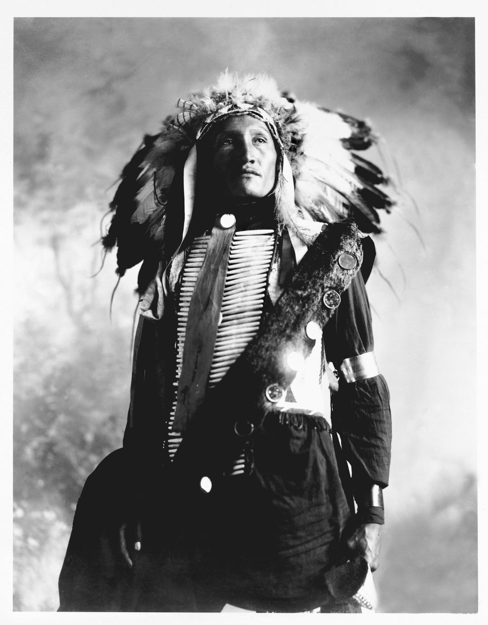 Eddie Plenty Holes, a Sioux Indian, c.1900 by American Photographer
