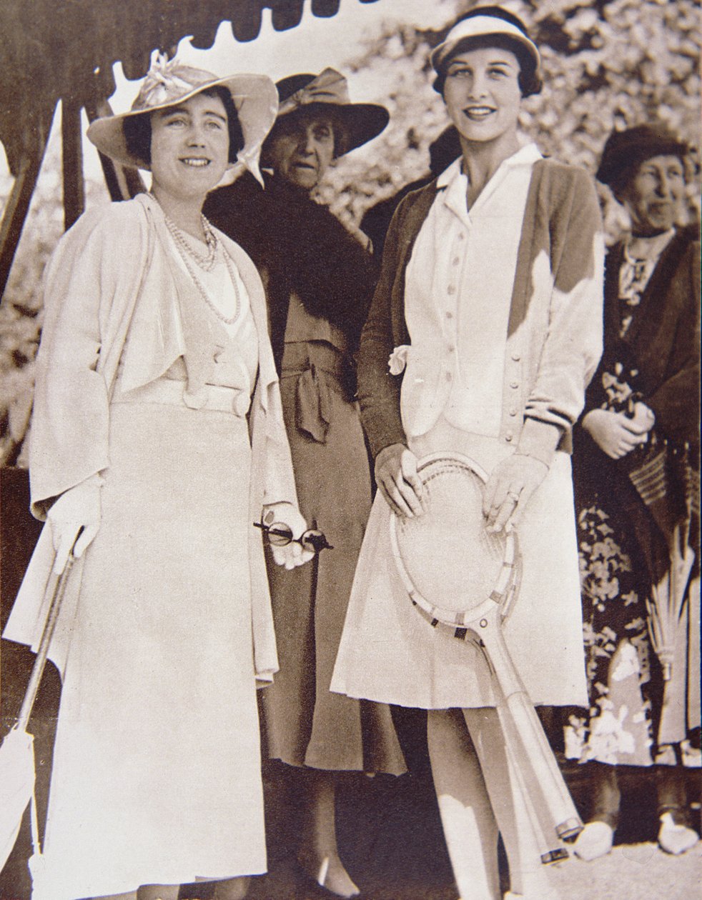 Mrs Helen Wills Moody (right) the American tennis champion, meets the Duchess of York at the All-England Club at Wimbledon during the Lawn Tennis Championship in 1935 by American Photographer