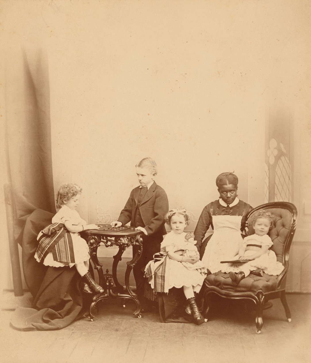 Portrait of a Woman and Four Children by American Photographer