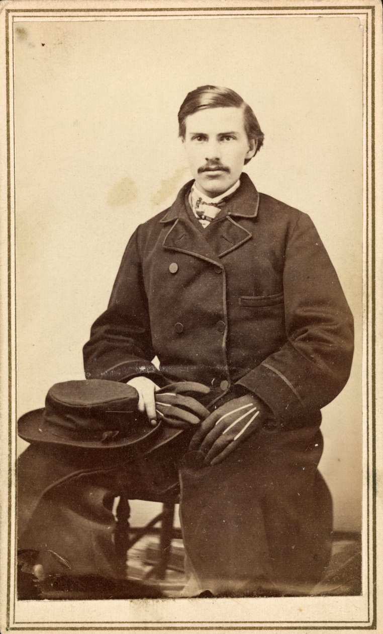 Unidentified man in overcoat with hat and gloves by American Photographer