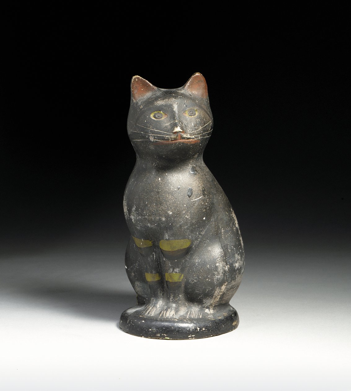 Molded and decorated cat by American School