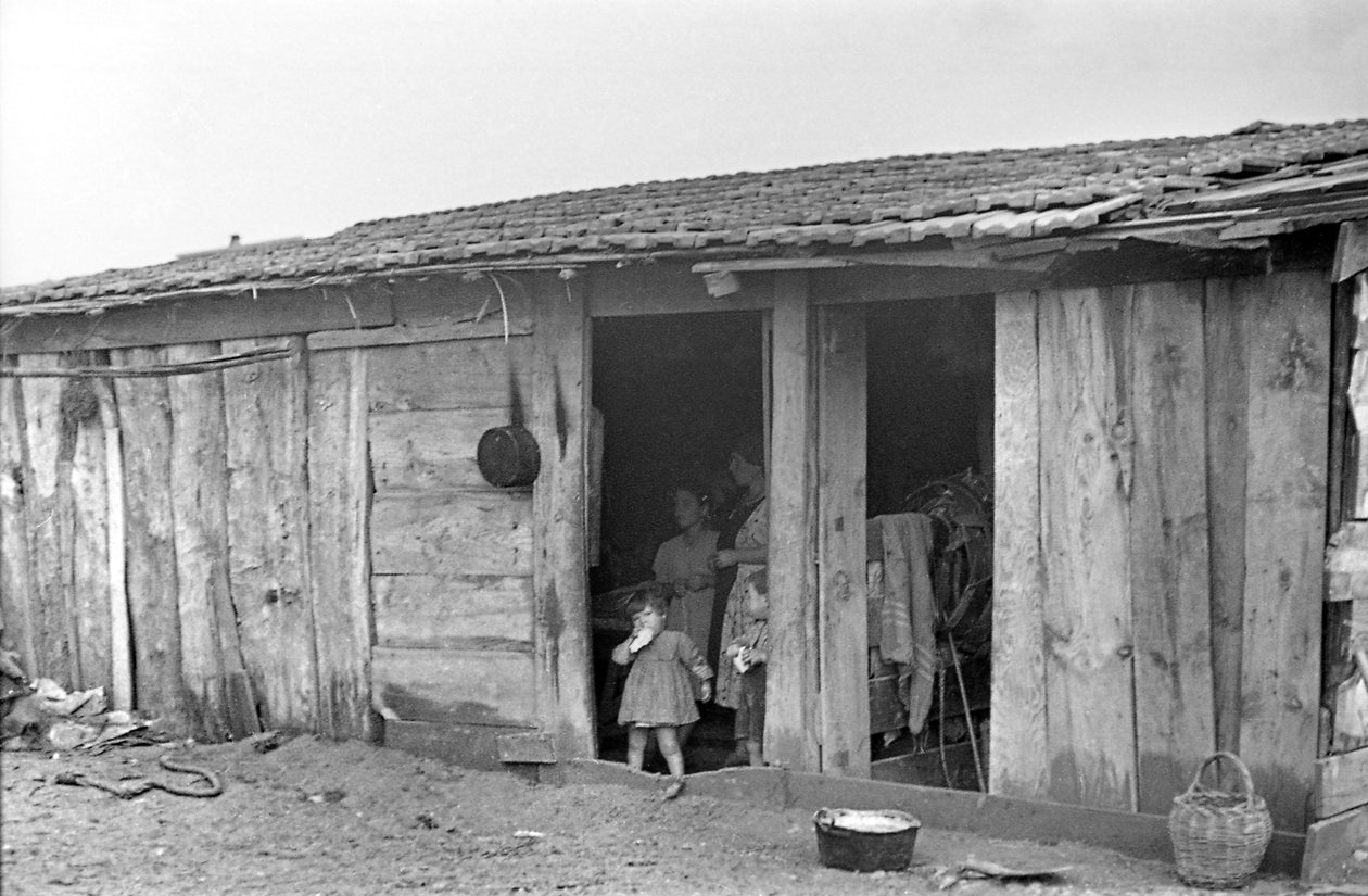 Crotone - Family with Children in the Farming Settlement by Ando Gilardi