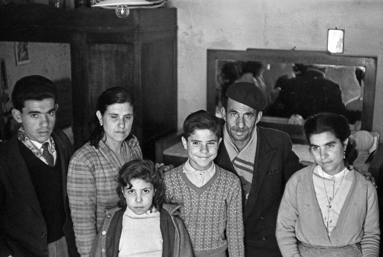 Family Group in an Interior by Ando Gilardi