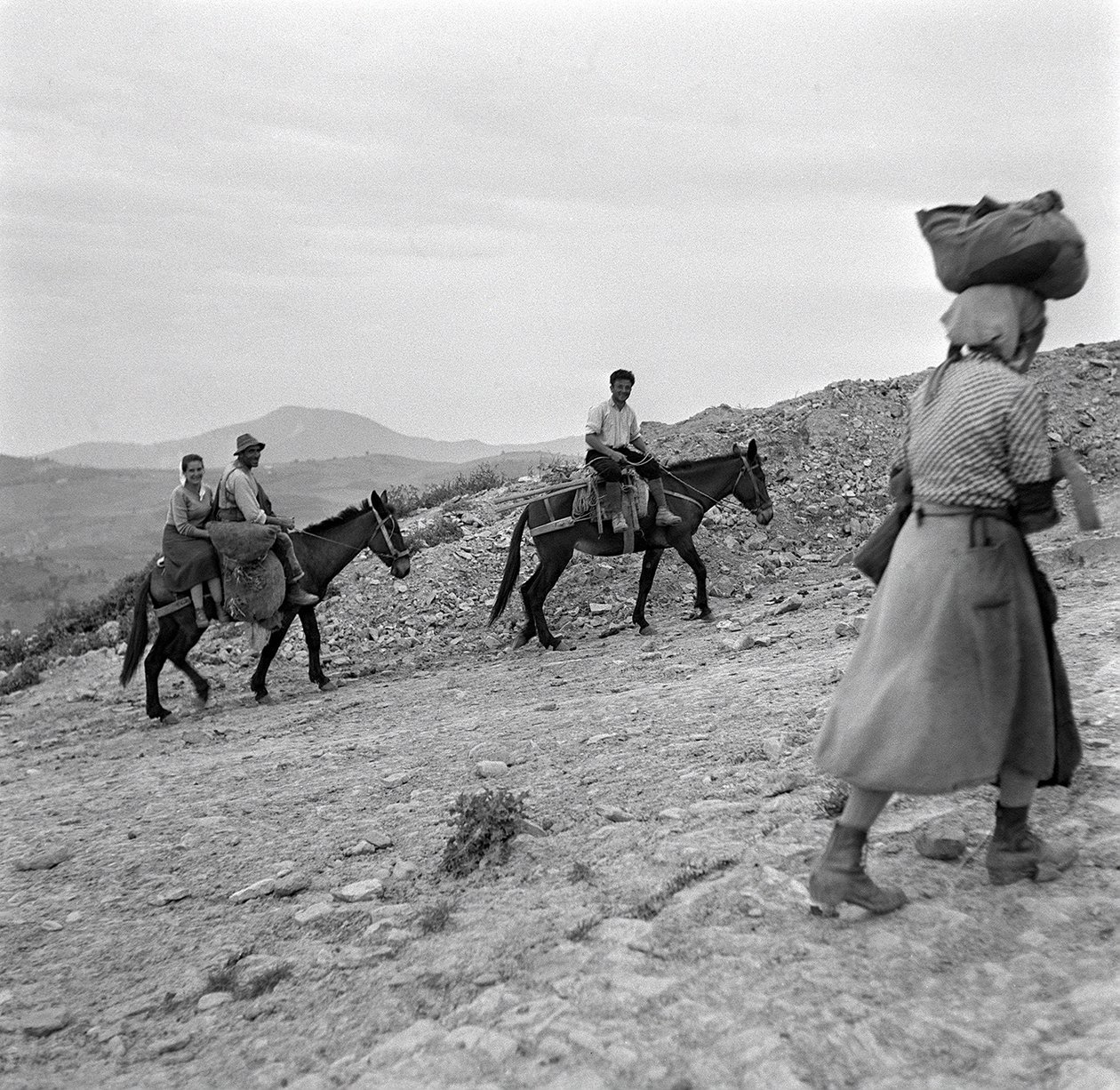 Farmers Going Back Home from the Fields in Lucania, Basilicata, Italy by Ando Gilardi