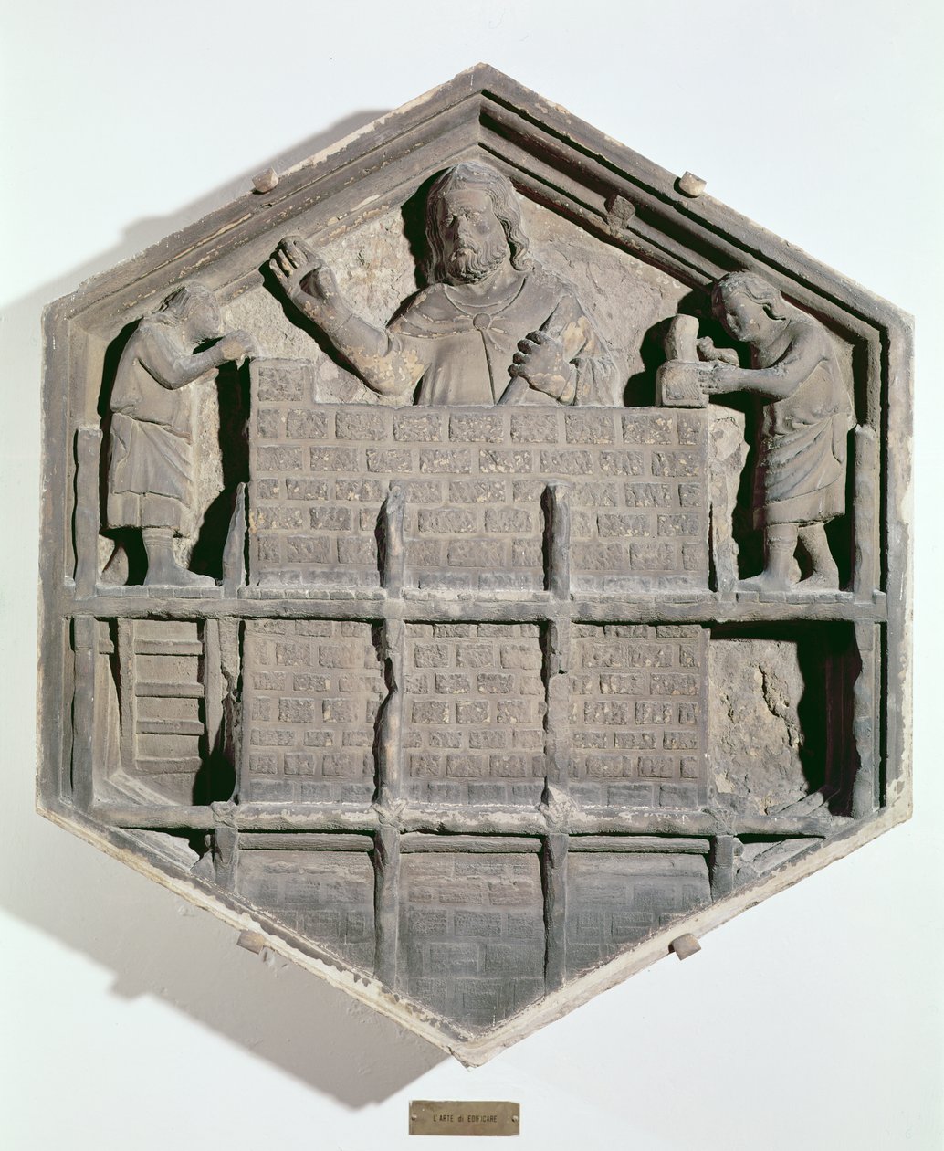 The Art of Building, hexagonal decorative relief tile from a series depicting the practitioners of the Arts and Sciences, possibly based on designs by Giotto by Andrea Pisano